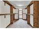 Spacious walk-in closet featuring wooden shelves and rods for ample storage space at 204 Knightsbridge, Charleston, SC 29418