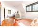 Attic bedroom with hardwood floors, two twin beds, and plenty of natural light at 205 Tea Farm Rd, Summerville, SC 29483