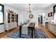 Dining room with vintage cabinet and open view into the hallway at 205 Tea Farm Rd, Summerville, SC 29483
