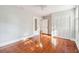 Bedroom featuring hardwood floors, white closet door, and light gray walls at 2178 Fort Pemberton Dr, Charleston, SC 29412