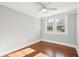 Bedroom featuring two windows, hardwood floors, ceiling fan, and light gray walls at 2178 Fort Pemberton Dr, Charleston, SC 29412