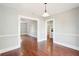 Dining room area with hardwood floors, with entry ways on the left and right to other rooms at 2178 Fort Pemberton Dr, Charleston, SC 29412