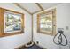 Well-lit laundry room features two windows, with wood trim, bright walls, and utility connections at 2178 Fort Pemberton Dr, Charleston, SC 29412