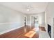 Bright and airy living room with hardwood floors and a decorative fireplace at 2178 Fort Pemberton Dr, Charleston, SC 29412