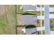 This aerial view shows the houses, backyards, and driveways on a neatly planned street at 221 Seaworthy St, Summerville, SC 29486
