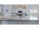 Modern kitchen featuring white cabinets, granite countertops, and stainless steel appliances at 221 Seaworthy St, Summerville, SC 29486