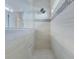 Modern tiled shower with a glass enclosure, sleek fixtures, and a tiled wall accent at 221 Seaworthy St, Summerville, SC 29486