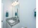 Bright bathroom featuring granite countertop vanity with a framed mirror and towel bar at 224 Hayworth Rd, Summerville, SC 29486