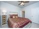 This bedroom features a ceiling fan and a side table with woven baskets for storage at 224 Hayworth Rd, Summerville, SC 29486
