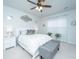 This bedroom offers soft natural light, neutral decor, and a cozy bench at the end of the bed at 224 Hayworth Rd, Summerville, SC 29486