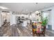 Open kitchen featuring stainless steel appliances, granite countertops, and a cozy breakfast nook at 224 Hayworth Rd, Summerville, SC 29486