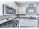 Well-equipped kitchen featuring granite countertops, stainless steel appliances, and ample cabinet space at 224 Hayworth Rd, Summerville, SC 29486
