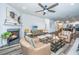 Cozy living room with a fireplace, ceiling fan, and view to the kitchen at 224 Hayworth Rd, Summerville, SC 29486