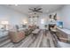 Comfortable living room featuring modern furniture, a fireplace, and a view to the backyard at 224 Hayworth Rd, Summerville, SC 29486