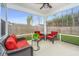 Relaxing screened porch with comfortable seating, perfect for outdoor enjoyment at 224 Hayworth Rd, Summerville, SC 29486
