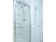 Clean, bright white shower with tiled walls, grab bar, and adjustable shower head at 224 Hayworth Rd, Summerville, SC 29486
