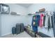 Bright walk-in closet with built-in wire shelving and rods, and trunk-style storage on the floor at 224 Hayworth Rd, Summerville, SC 29486