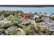 Charming home with lush landscaping and neighborhood street access near a scenic lake with docks at 2269 Hartfords Bluff Cir, Mount Pleasant, SC 29466