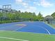 Spacious community basketball court featuring well-kept playing surfaces and lighting for evening games at 2269 Hartfords Bluff Cir, Mount Pleasant, SC 29466
