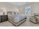 Comfortable bedroom featuring soft hues, ample light, and cozy seating at 2269 Hartfords Bluff Cir, Mount Pleasant, SC 29466