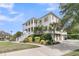 Beautiful two story home with wraparound porch, garage, and lush landscaping at 2269 Hartfords Bluff Cir, Mount Pleasant, SC 29466