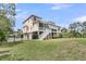 Back of house with grassy yard at 2269 Hartfords Bluff Cir, Mount Pleasant, SC 29466