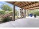 Outdoor patio with a wood-beamed ceiling at 2269 Hartfords Bluff Cir, Mount Pleasant, SC 29466