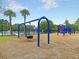 Fun community playground with swings, slides, and climbing structures, perfect for Gathering enjoyment at 2269 Hartfords Bluff Cir, Mount Pleasant, SC 29466