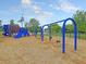 Vibrant community playground featuring slides, swings, and climbing structures for entertainment at 2269 Hartfords Bluff Cir, Mount Pleasant, SC 29466