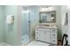 A modern bathroom featuring a glass-enclosed shower, updated vanity, and elegant fixtures at 2355 Andell Way, Seabrook Island, SC 29455