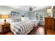 A bright bedroom with two beds, hardwood floors and a relaxing coastal theme at 2355 Andell Way, Seabrook Island, SC 29455