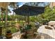 Outdoor deck with a table and chairs, with views of a scenic landscape at 2355 Andell Way, Seabrook Island, SC 29455