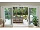 Wide open doorway to a spacious deck with views of the landscaped backyard at 2355 Andell Way, Seabrook Island, SC 29455