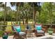 Spacious deck with beautiful patio furniture and lush green backyard at 2355 Andell Way, Seabrook Island, SC 29455