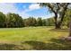 View of a beautifully maintained golf course with green grass and mature oak trees at 2355 Andell Way, Seabrook Island, SC 29455