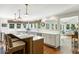 Bright eat-in kitchen with an island, stone countertops, and an open floor plan at 2355 Andell Way, Seabrook Island, SC 29455