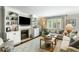 Cozy living room featuring a fireplace, built-in shelving, and comfortable seating at 2355 Andell Way, Seabrook Island, SC 29455