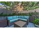Cozy back porch with comfortable outdoor sectional seating at 24 Archdale St, Charleston, SC 29401
