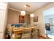 Dining room with modern lighting at 24 Archdale St, Charleston, SC 29401