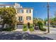 Charming two-story home with a garage, black shutters and well-manicured landscaping at 24 Archdale St, Charleston, SC 29401
