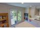 Bright kitchen features stainless steel appliances, marble countertops, and sliding doors to a balcony at 24 Archdale St, Charleston, SC 29401