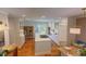 Open kitchen features center island and access to back porch at 24 Archdale St, Charleston, SC 29401
