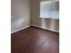 Bedroom with laminated floors and a window at 2502 Hidden Cove Dr # 2502, Moncks Corner, SC 29461