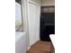 Well-equipped kitchen showcasing a black refrigerator and a stackable washer and dryer at 2502 Hidden Cove Dr # 2502, Moncks Corner, SC 29461