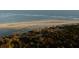 Aerial view of beach and dunes with path at 2802 Ion Ave, Sullivans Island, SC 29482