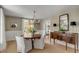 Traditional dining room with a wood table, six chairs, and elegant decor at 2802 Ion Ave, Sullivans Island, SC 29482