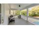 Inviting front porch with comfortable seating, offering a relaxing outdoor space at 2802 Ion Ave, Sullivans Island, SC 29482