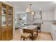 Bright kitchen with a center island, ample counter space, and a breakfast nook in the background at 2802 Ion Ave, Sullivans Island, SC 29482