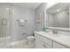 Bright bathroom with a white vanity, glass-enclosed shower, and neutral gray paint at 282 Great Lawn Dr, Summerville, SC 29486