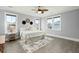 Comfortable bedroom featuring plush bedding, light wood floors, and plenty of natural light at 282 Great Lawn Dr, Summerville, SC 29486